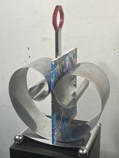  REVERE METALS COMPANY MODERNIST ART DECO CHROME AND RED BAKELITE MAGAZINE RACK BY REVERE