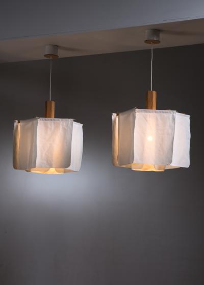  Robygge AB Pair of Erik Asmussen pine and fabric pendants