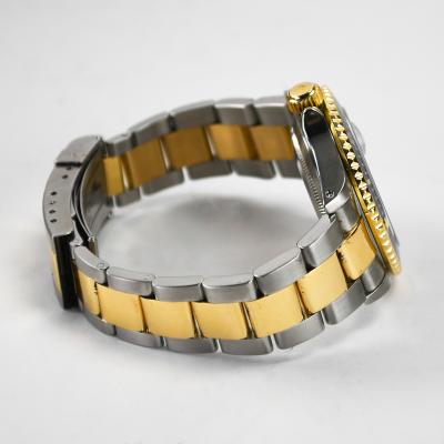  Rolex Watch Co Rolex Submariner 1999 Two Tone Blue Dial MDL 16613 36mm