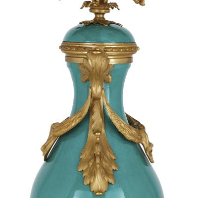  S vres Porcelain Manufactory Pair of gilt bronze and turquoise porcelain candelabra