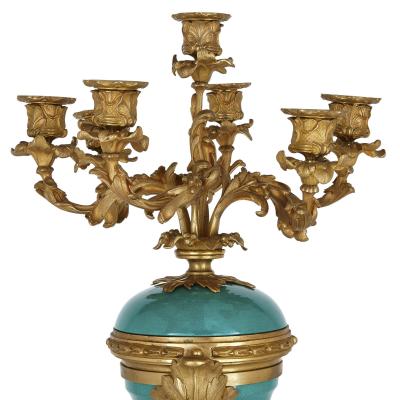  S vres Porcelain Manufactory Pair of gilt bronze and turquoise porcelain candelabra