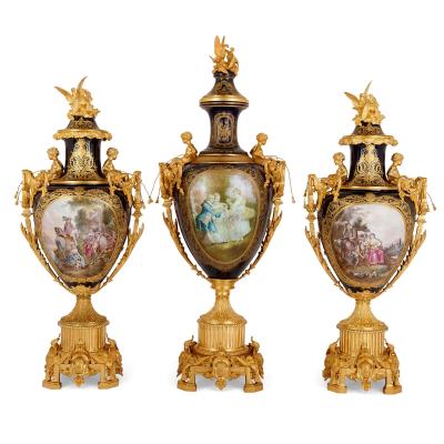  S vres Porcelain Manufactory Set of three large S vres style porcelain vases with gilt bronze pedestals