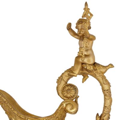  S vres Porcelain Manufactory Two large Rococo style porcelain and gilt bronze jugs