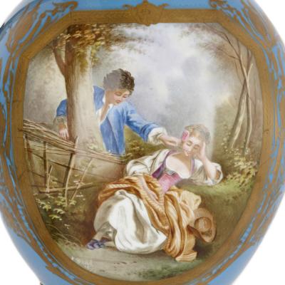  S vres Porcelain Manufactory Two large Rococo style porcelain and gilt bronze jugs