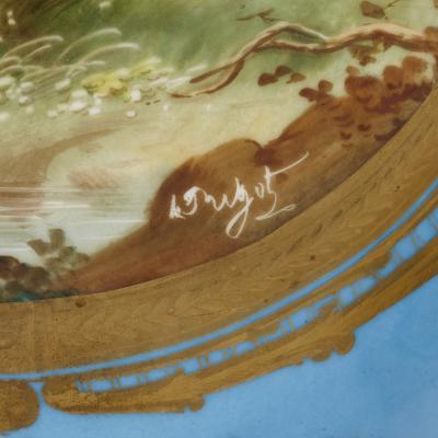  S vres Porcelain Manufactory Two large Rococo style porcelain and gilt bronze jugs