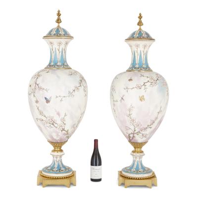  Sevres Manufacture Nationale de S vres Two large gilt bronze mounted Rococo style white porcelain vases