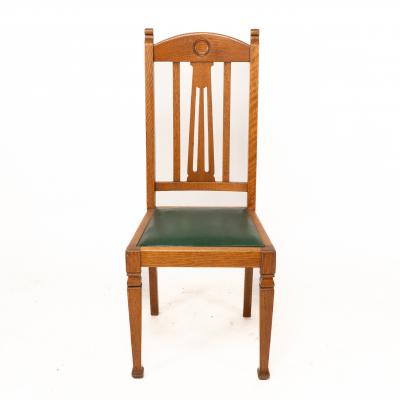  Shapland Petter Shapland Petter A Set of Four Arts Crafts Oak Dining Chairs
