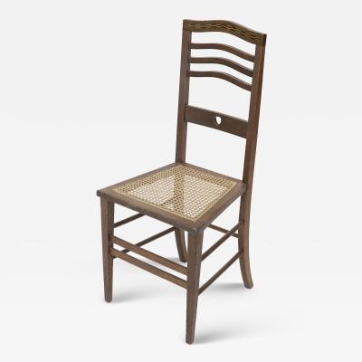  Shapland Petter Shapland Petter An Arts Crafts Inlaid Oak Side Chair with a Pierced Heart