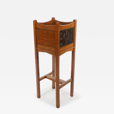  Shapland Petter Shapland Petter An Arts Crafts Oak Planter with Copper Heart Shaped Panels