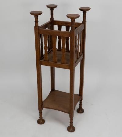  Shapland Petter Shapland Petter Arts Crafts oak plantstand with Voysey style disc finials 