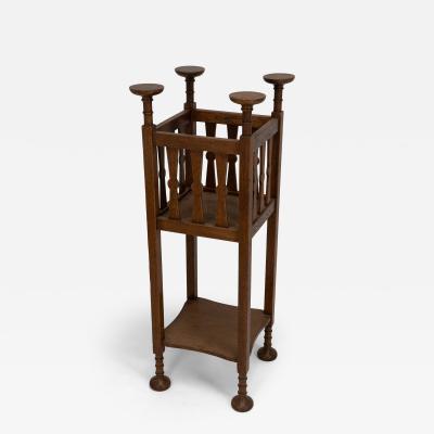  Shapland Petter Shapland Petter Arts Crafts oak plantstand with Voysey style disc finials 