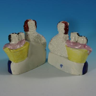  Staffordshire Pair Staffordshire Spaniel and Pups in Wash Baskets