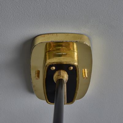  Stilnovo 1950s Stilnovo Perforated Black Metal and Brass Sconce with Stamped Label
