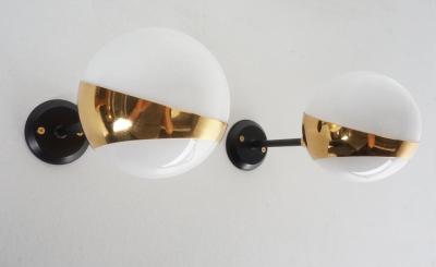  Stilnovo PAIR OF STILNOVO STYLE ARTICULATING SCONCES