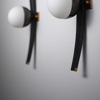  Stilnovo Pair of 1950s Italian Stilnovo Sconces in Brass Black Lacquered Wood and steel