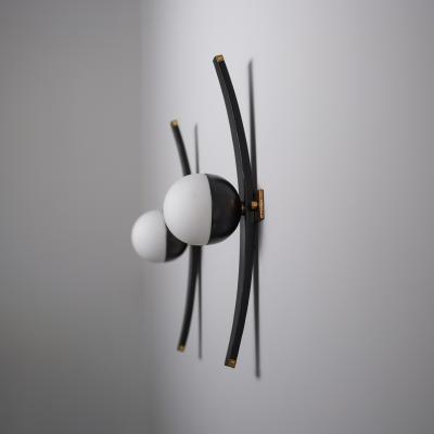  Stilnovo Pair of 1950s Italian Stilnovo Sconces in Brass Black Lacquered Wood and steel