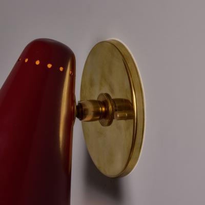  Stilnovo Pair of 1960s Stilnovo Perforated Red Metal and Brass Articulating Sconces