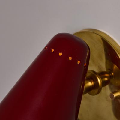 Stilnovo Pair of 1960s Stilnovo Perforated Red Metal and Brass Articulating Sconces