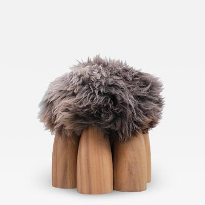  Studio Arno Declercq STUDIO ARNO DECLERCQ SENUFO OTTOMAN IN NATURAL AFRICAN WALNUT AND SHEEPSKIN