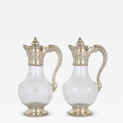  T tard Fr res Pair of vermeil and cut glass claret jugs by T tard