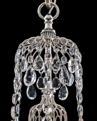  Thomas F C Osler A PAIR OF SILVERED AND CRYSTAL CHANDELIERS BY OSLER FARADAY