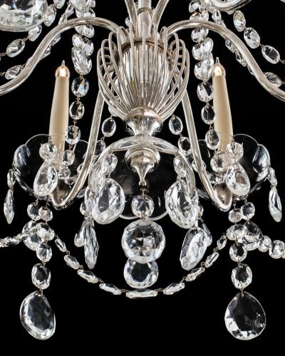  Thomas F C Osler A PAIR OF SILVERED AND CRYSTAL CHANDELIERS BY OSLER FARADAY