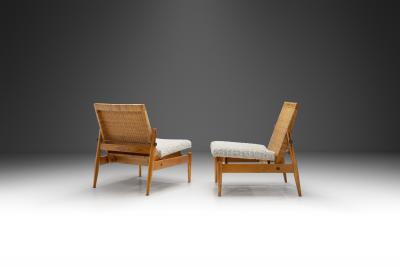  ULUV Kr sn jizba Pair of Upholstered Rattan and Wood Chairs for ULUV Czechoslovakia ca 1960s
