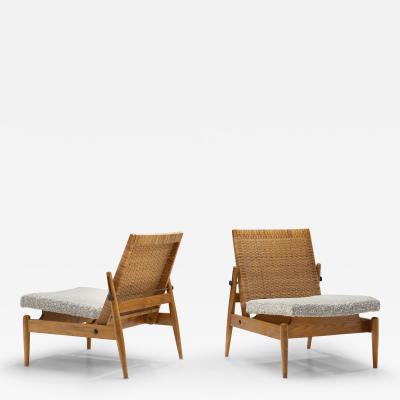  ULUV Kr sn jizba Pair of Upholstered Rattan and Wood Chairs for ULUV Czechoslovakia ca 1960s