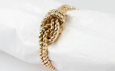  Van Cleef Arpels Van Cleef Arpels Hidden Watch Gold Knot Bracelet Circa 1960s
