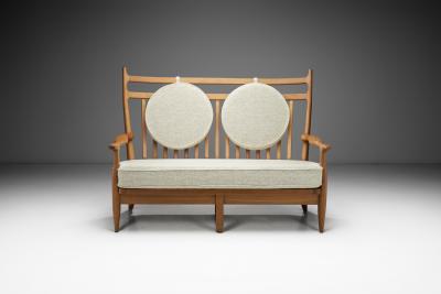  Votre Maison Guillerme et Chambron Two Seater Oak Sofa for Votre Maison France 1960s