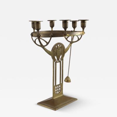  WMF W rttembergische Metallwarenfabrik W M F WMF An Art Nouveau candelabra with an owl 6 sconces to the main circular ring 