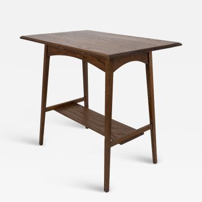  Waring Gillow Waring and Gillows A pair of Arts Crafts oblong side tables with curved aprons