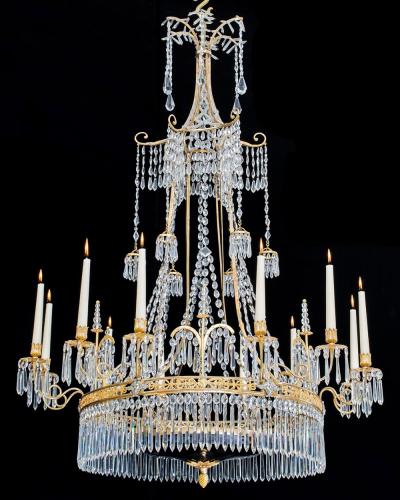 Werner Mieth A GERMAN NEOCLASSICAL SILVER AND GILT BRONZE TWELVE LIGHT CRYSTAL CHANDELIER