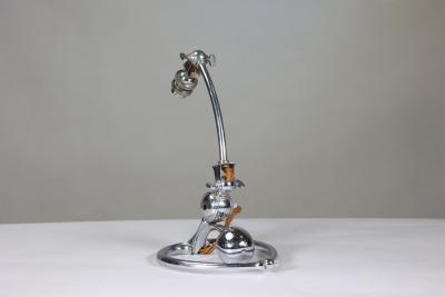  William Benson W A S Benson Co W A S Benson An Arts and Crafts chrome plated table lamp with heart shaped base