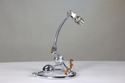  William Benson W A S Benson Co W A S Benson An Arts and Crafts chrome plated table lamp with heart shaped base