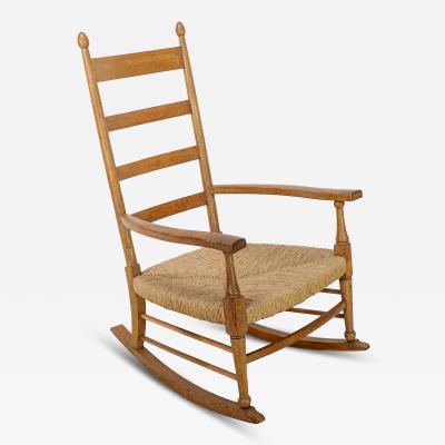  William Birch Ltd William Birch an Arts Crafts Light Oak Rocking Chair with Newly Laid Rush Seat