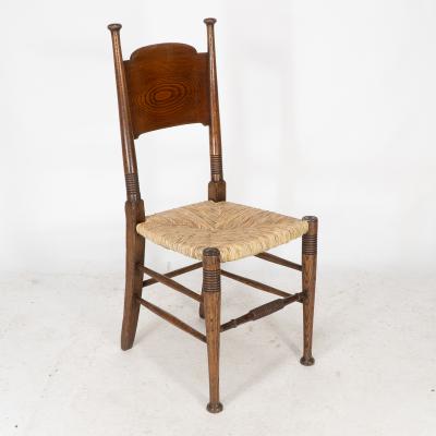  William Birch Ltd William Birch for Liberty Co A Pair of Arts Crafts Rush Seat Oak Chairs