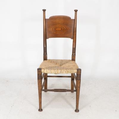  William Birch Ltd William Birch for Liberty Co A Pair of Arts Crafts Rush Seat Oak Chairs