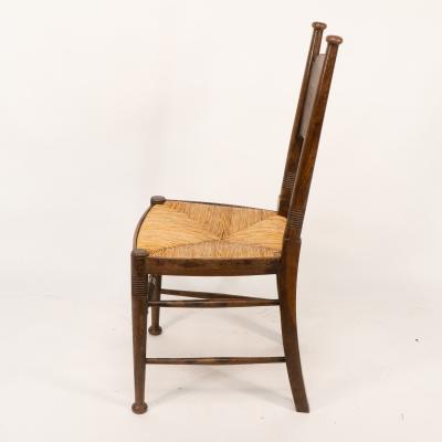  William Birch Ltd William Birch retailed by Liberty Co Pair of Arts Crafts oak dining chairs