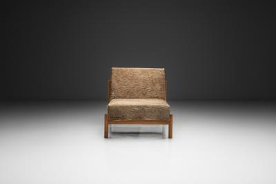  Wim Den Boon Oak Lounge Chair in Champagne Ponyskin by Wim den Boon the Netherlands 1960s