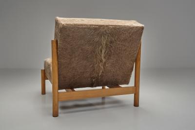  Wim Den Boon Oak Lounge Chair in Champagne Ponyskin by Wim den Boon the Netherlands 1960s