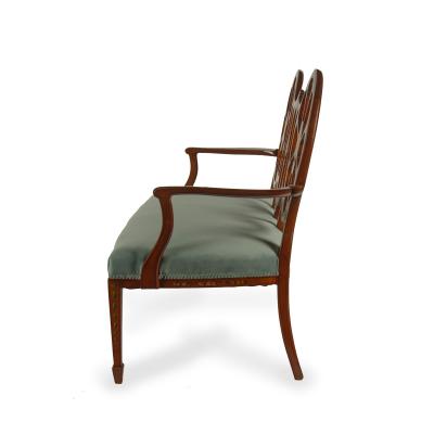  Wright and Mansfield Victorian satinwood wheel back settee in Chippendale style