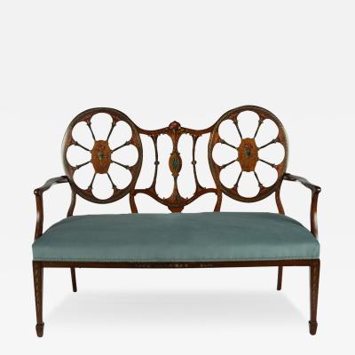  Wright and Mansfield Victorian satinwood wheel back settee in Chippendale style
