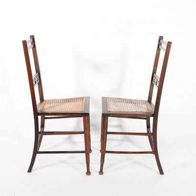  Wylie Lochhead A Pair of Arts Crafts Side Chairs with Stylized Tulip Cut outs to the Back