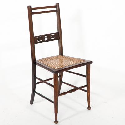  Wylie Lochhead A Pair of Arts Crafts Side Chairs with Stylized Tulip Cut outs to the Back