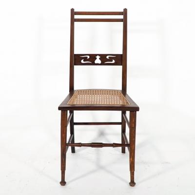  Wylie Lochhead A Pair of Arts Crafts Side Chairs with Stylized Tulip Cut outs to the Back