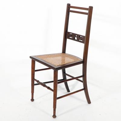  Wylie Lochhead A Pair of Arts Crafts Side Chairs with Stylized Tulip Cut outs to the Back