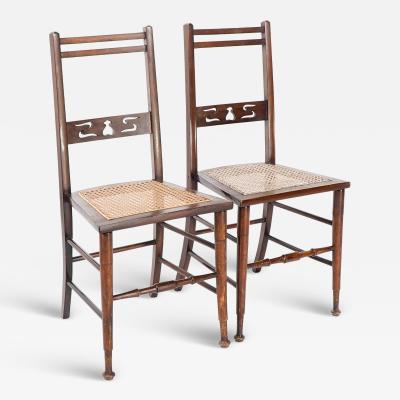  Wylie Lochhead A Pair of Arts Crafts Side Chairs with Stylized Tulip Cut outs to the Back