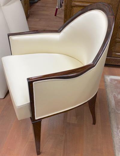  mile Jacques Ruhlmann J E Ruhlmann pair of refined solid Makassar arm chairs covered in satin silk