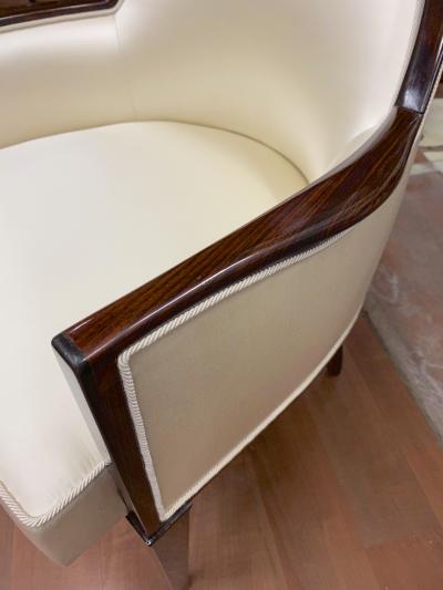  mile Jacques Ruhlmann J E Ruhlmann pair of refined solid Makassar arm chairs covered in satin silk